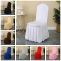Elegant white Spandex wedding chair cover with pleated skirt, stretchy luxury fabric for hotel and banquet event decoration.
