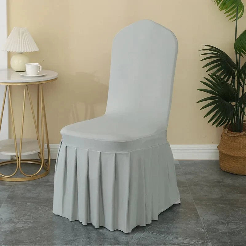 Luxury stretch spandex wedding chair cover with pleated skirt, elegant and elastic for banquet and event decoration.