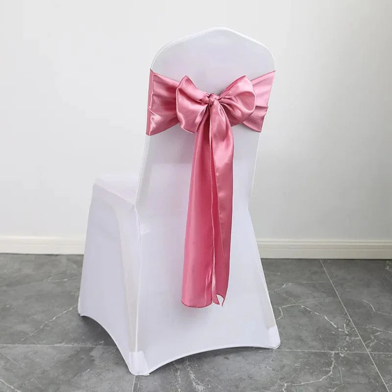 Shiny satin wedding chair sash from EVENTSDECOR with a luxurious bow design, 15x275cm, perfect for elegant wedding decor.