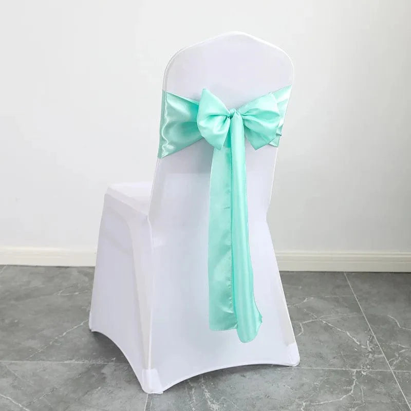 Shiny satin wedding chair sash with elegant bow in various colors, perfect for luxury wedding and event decor.