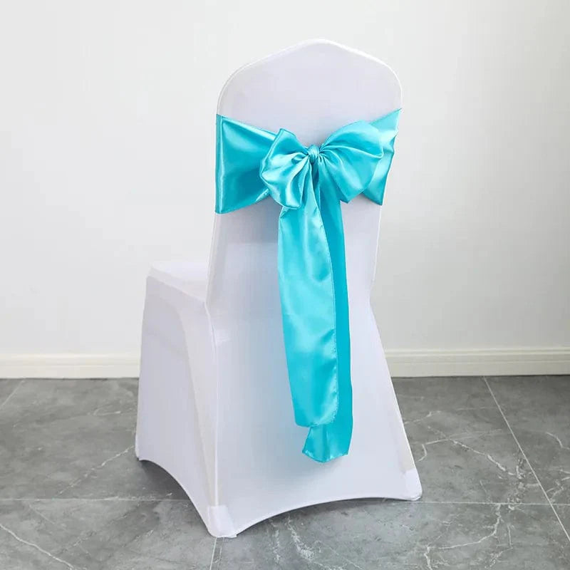 Shiny satin wedding chair sash with luxury bow, 15x275cm, showing elegant gold color and satin fabric for wedding decor.