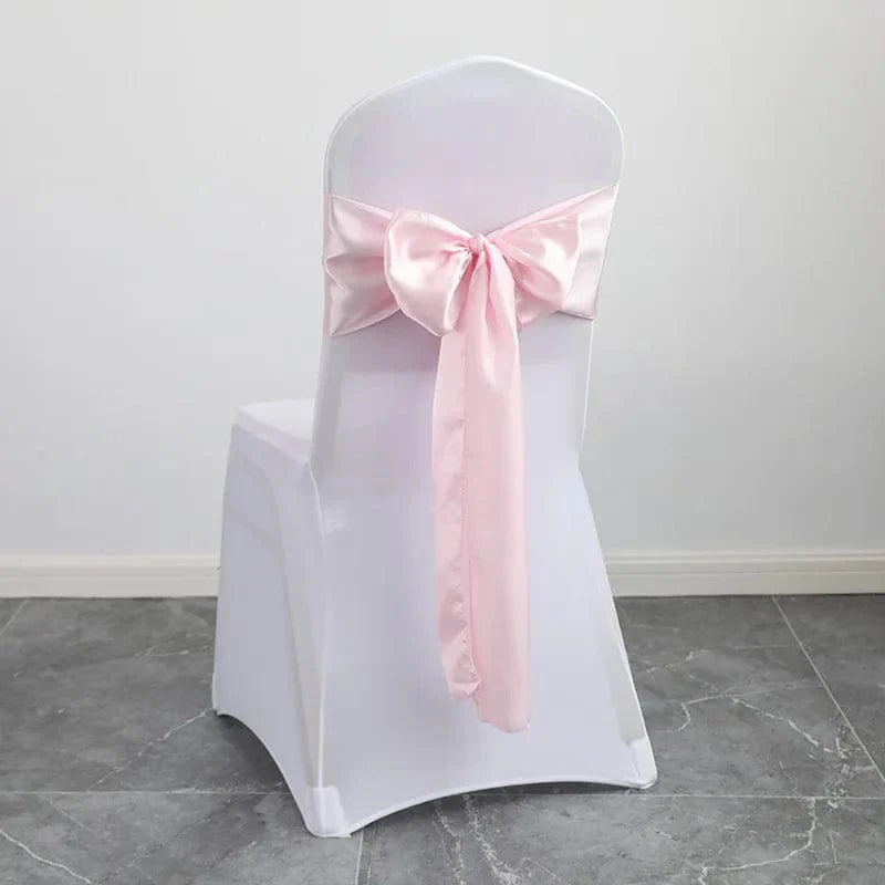 Shiny satin wedding chair sash with luxury bow design, 15x275cm, ideal for wedding decor and special event seating.