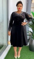 Luxury velvet African evening gown by Showlu Fashion, featuring Dubai Ankara style, perfect for weddings and special occasions.