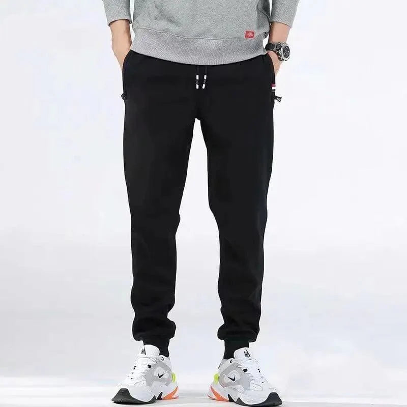 Men's winter fleece joggers with warm lambswool lining, casual harem sweatpants featuring drawstring waist and straight legs.