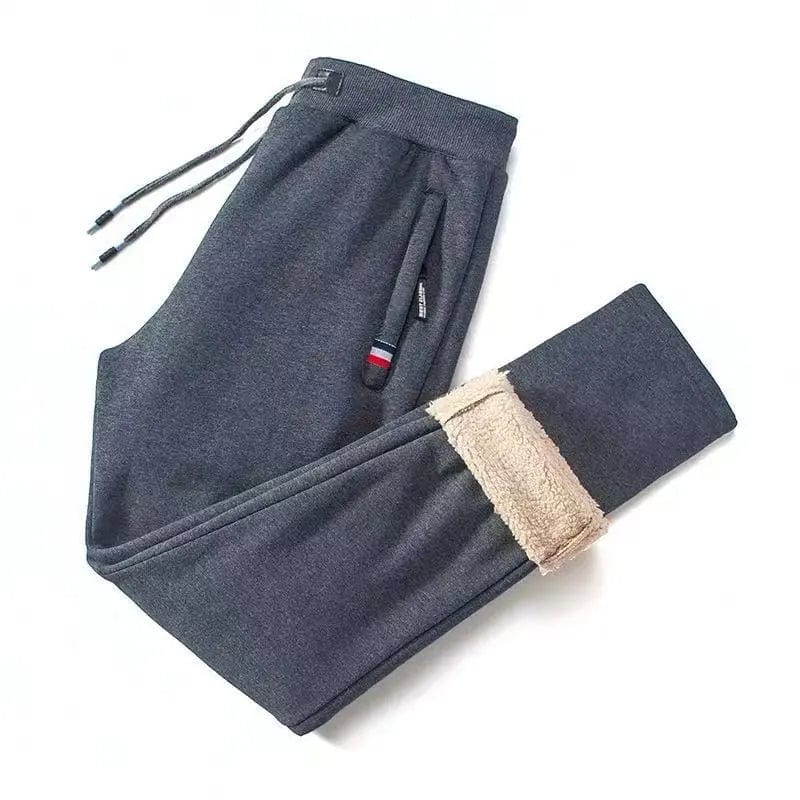 Men's winter fleece joggers with lambswool lining, drawstring waist, straight fit, and casual harem style in solid color.