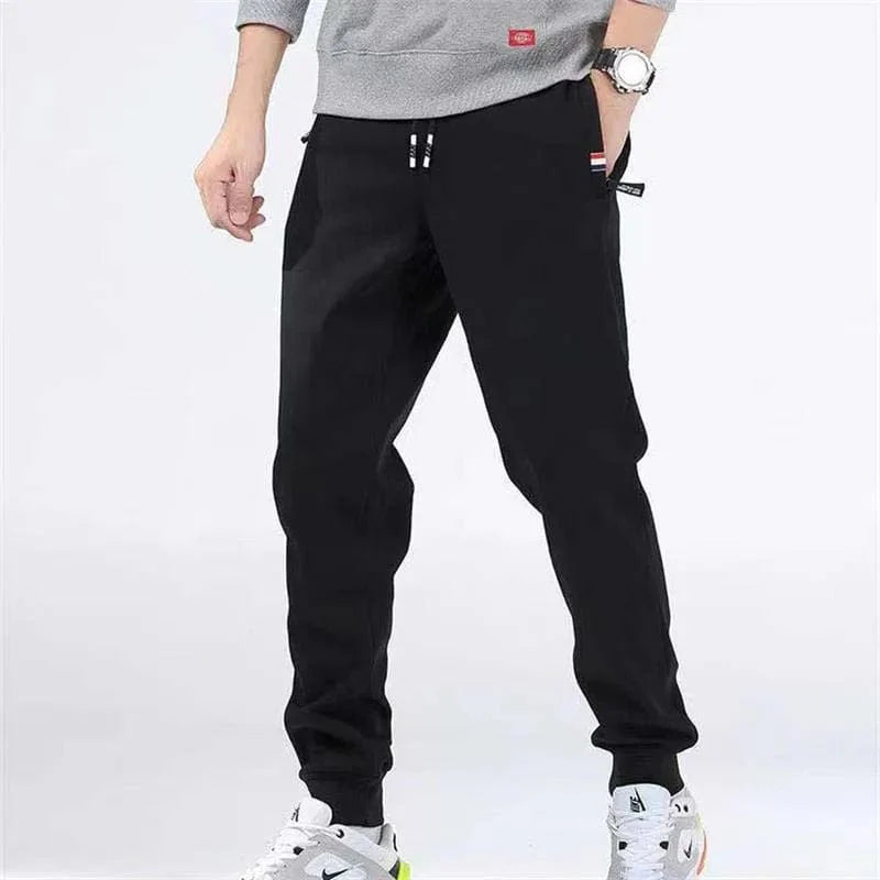 Men's fleece joggers with lambswool lining, drawstring waist, and straight fit, ideal for winter casual wear by Showlu Fashion.