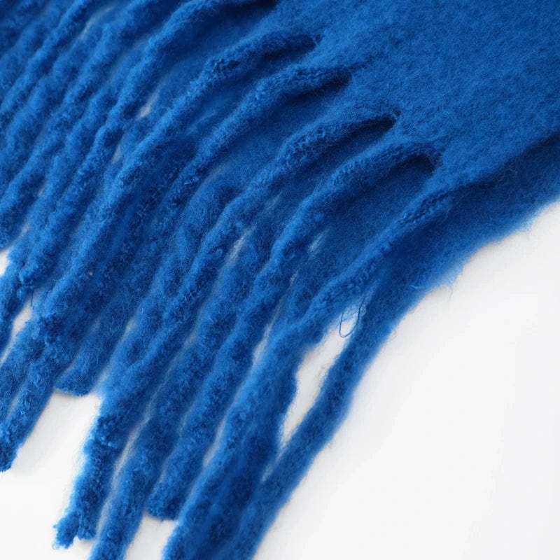 Luxury women's cashmere winter scarf with tassels, thick and warm, soft solid-color shawl for cold weather.
