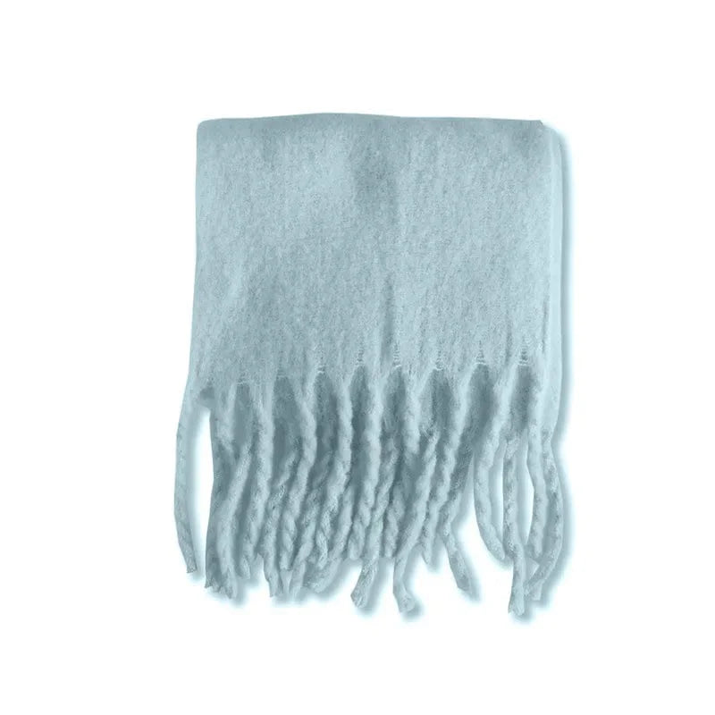 Luxury women's cashmere winter scarf with tassels, thick, warm, soft, solid color shawl for cozy autumn and winter wear.