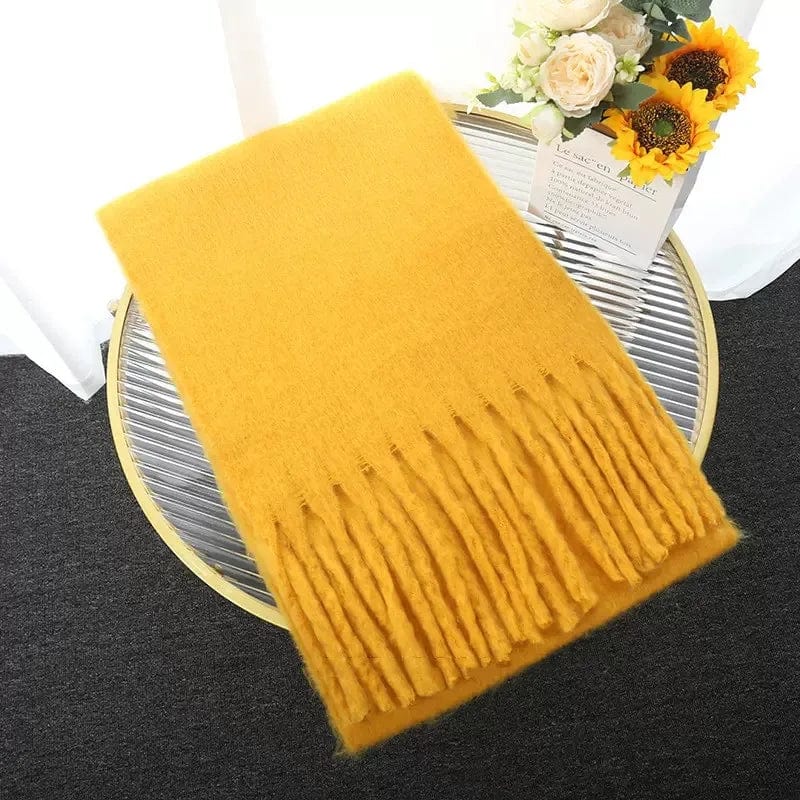 Luxury women's cashmere winter scarf with tassels, thick and warm, soft solid color shawl for cold weather warmth and style.