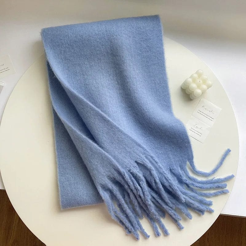 Luxury women's cashmere winter scarf with thick, warm fabric, tassels, and solid color, perfect as a cozy shawl for cold weather.