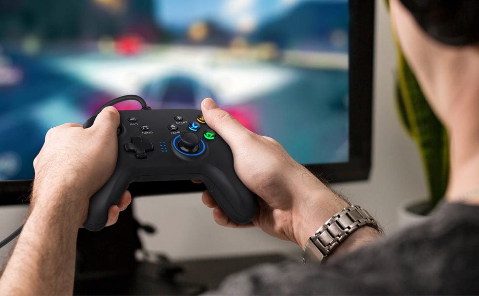 Doba wired gaming controller with dual vibration, compatible with PC, PS3, Android, and other devices, featuring ergonomic joystick design.