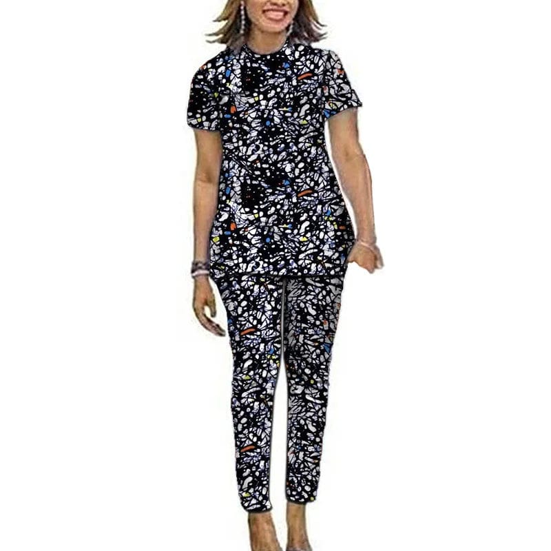 Women's Ankara African print top and pants set by Showlu Fashion, featuring short sleeves, patch details, perfect for festive occasions.