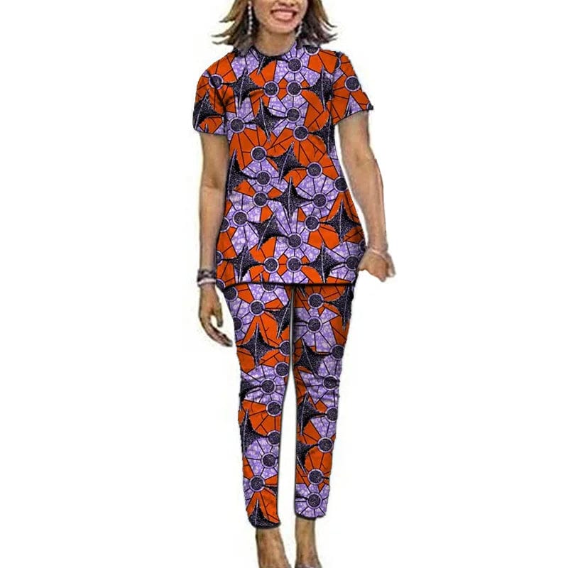 Women wearing Showlu Fashion African Ankara print top and pants set, featuring short sleeves and vibrant Nigerian-inspired patterns.