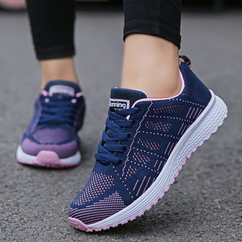 Women's breathable mesh walking shoes by SHOWLU FASHION STORE, flat lace-up sneakers in white with casual, comfortable design.