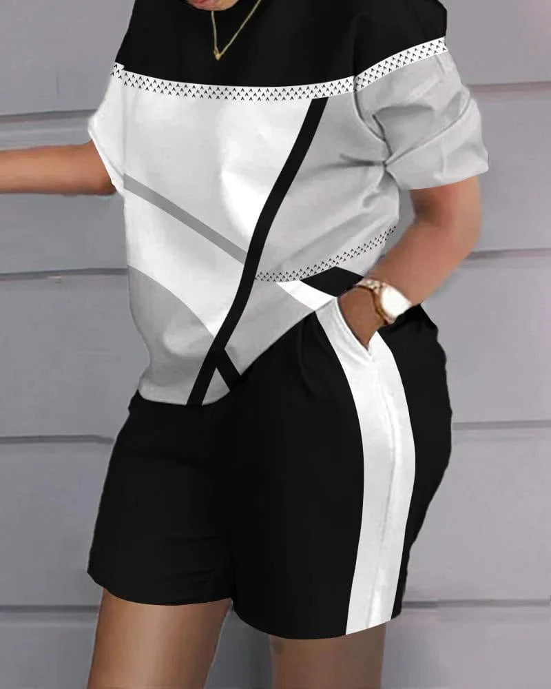 Owner Girl Women's summer two-piece set with letter print T-shirt and shorts, casual and stylish for warm weather.
