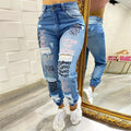 Women’s slim-fit denim pencil jeans with printed ankle-length design, pockets, zipper fly, and slight stretch for a stylish look.