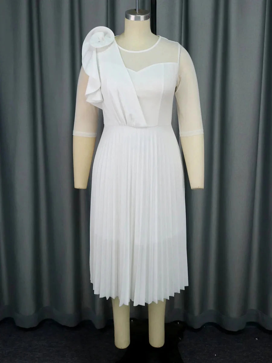 Elegant white A-line tulle dress for women featuring pleats, ruffles, and half sleeves, ideal for wedding guests and evening events.