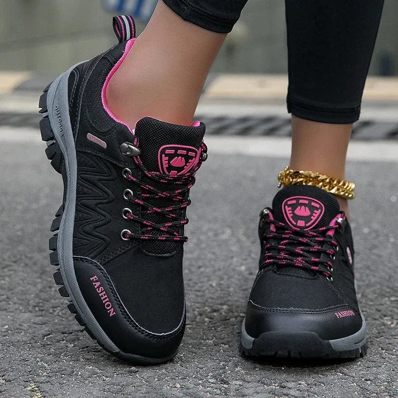 AZGB Women's waterproof hiking shoes, non-slip outdoor walking sneakers with sturdy soles and breathable material for outdoor adventures.
