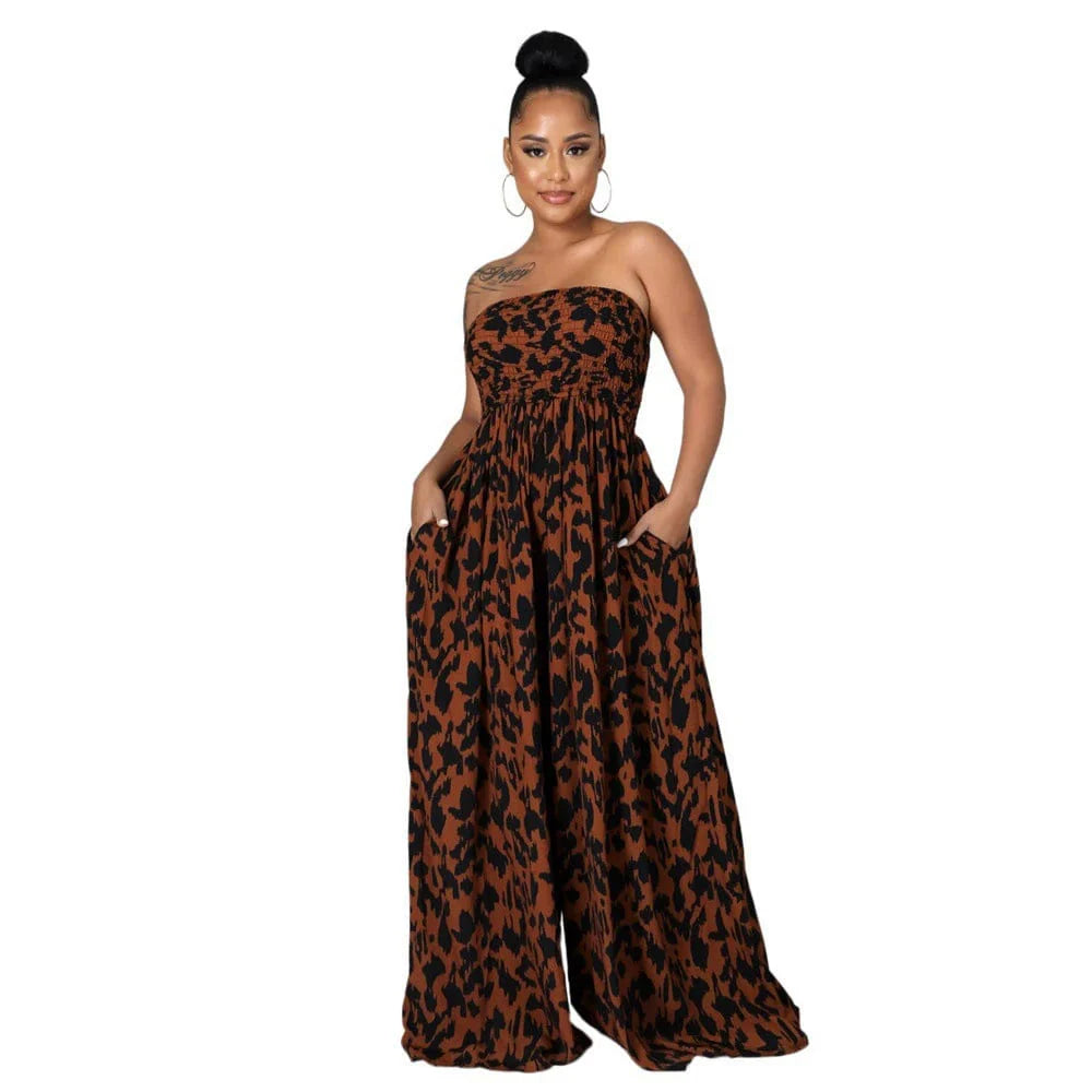 Women wearing a loose-fit wide-leg tube top jumpsuit by Showlu Fashion, perfect for summer, with a relaxed style and comfortable fit.
