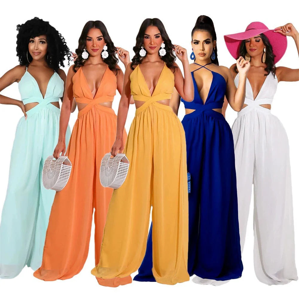 Women wearing Showlu Fashion women's loose wide-leg tube top jumpsuit, perfect for summer, featuring a relaxed fit and stylish design.