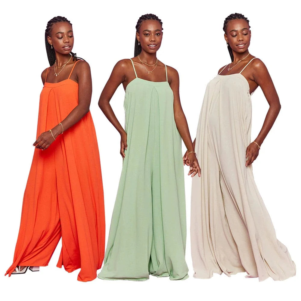 Women wearing Showlu Fashion women's loose wide-leg tube top jumpsuit, featuring a relaxed fit and summer style.