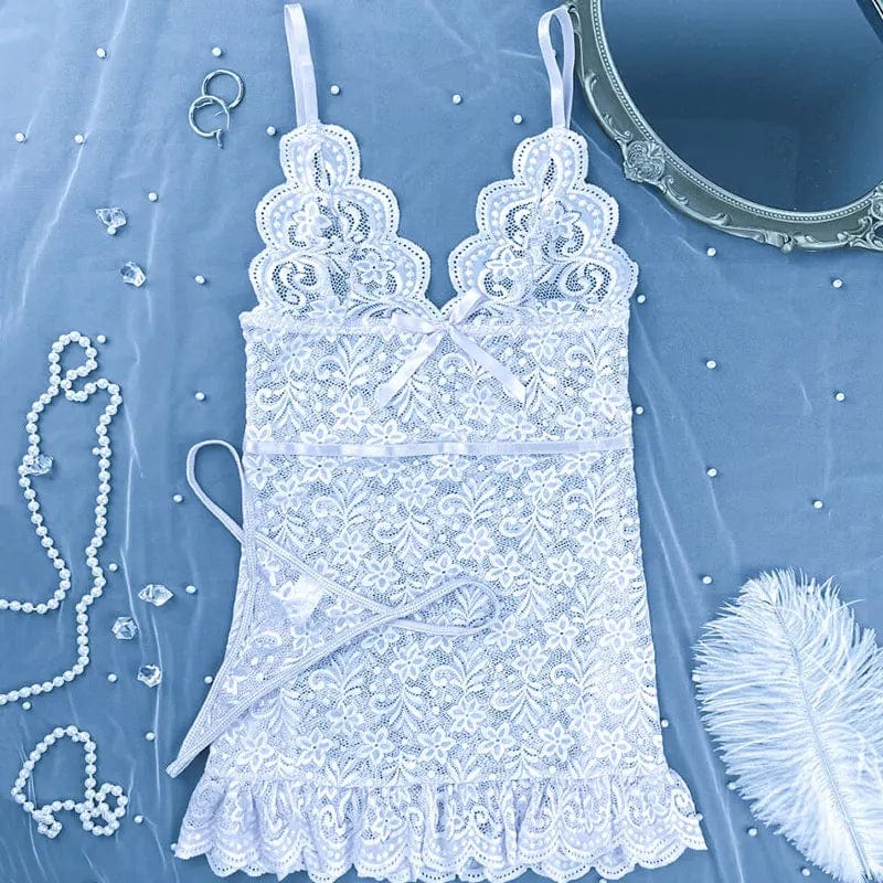 Women’s floral lace mini dress by Showlu, sleeveless backless nightwear with sheer, sexy floral lace details and a fitted silhouette.