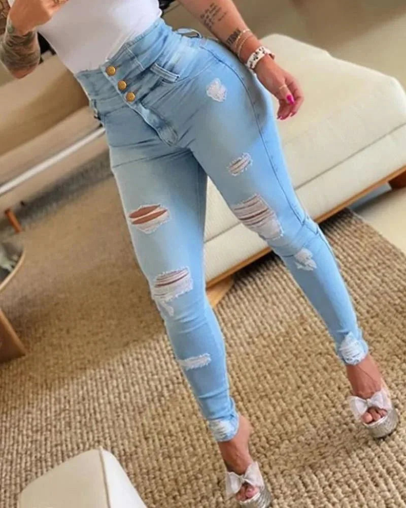 Women’s high waist skinny shaping jeans by Showlu Fashion with distressed denim, push-up effect, and stylish slim fit for women.