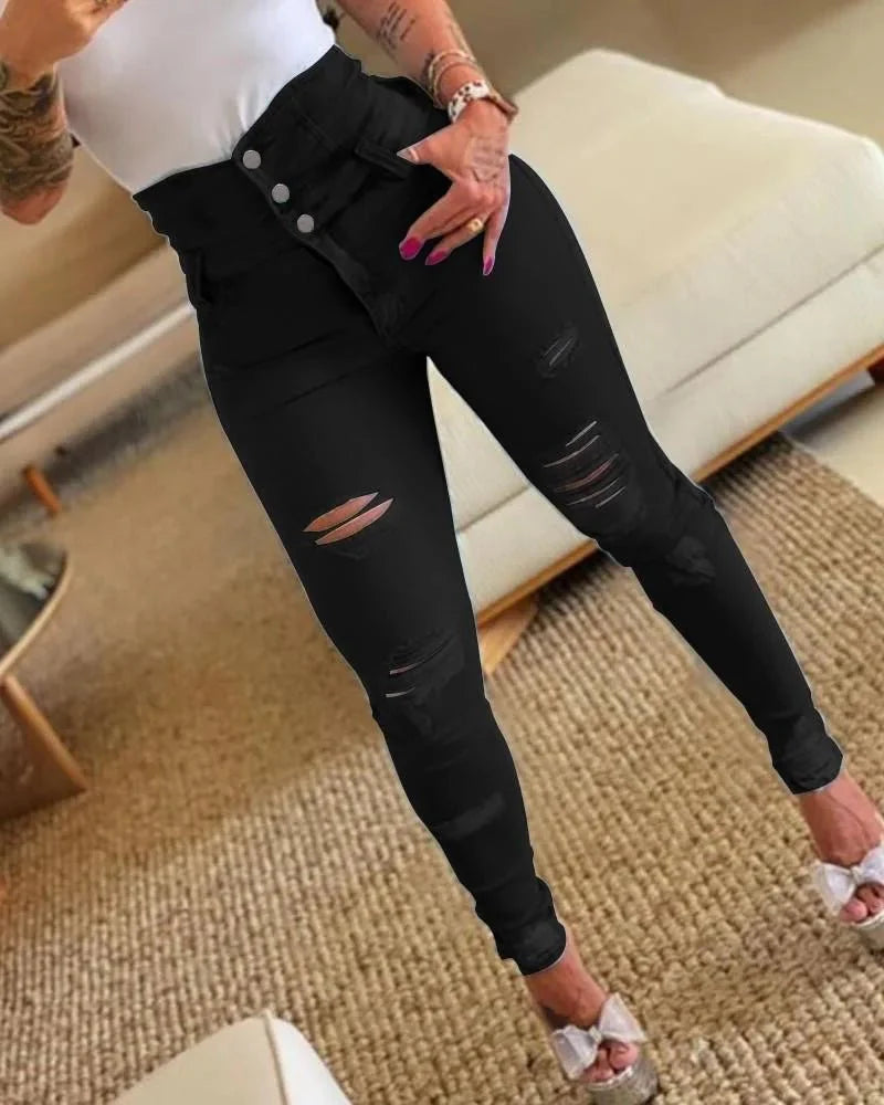 Women’s high waist skinny shaping jeans by Showlu Fashion with distressed denim, push-up lift effect, and stylish slim fit.