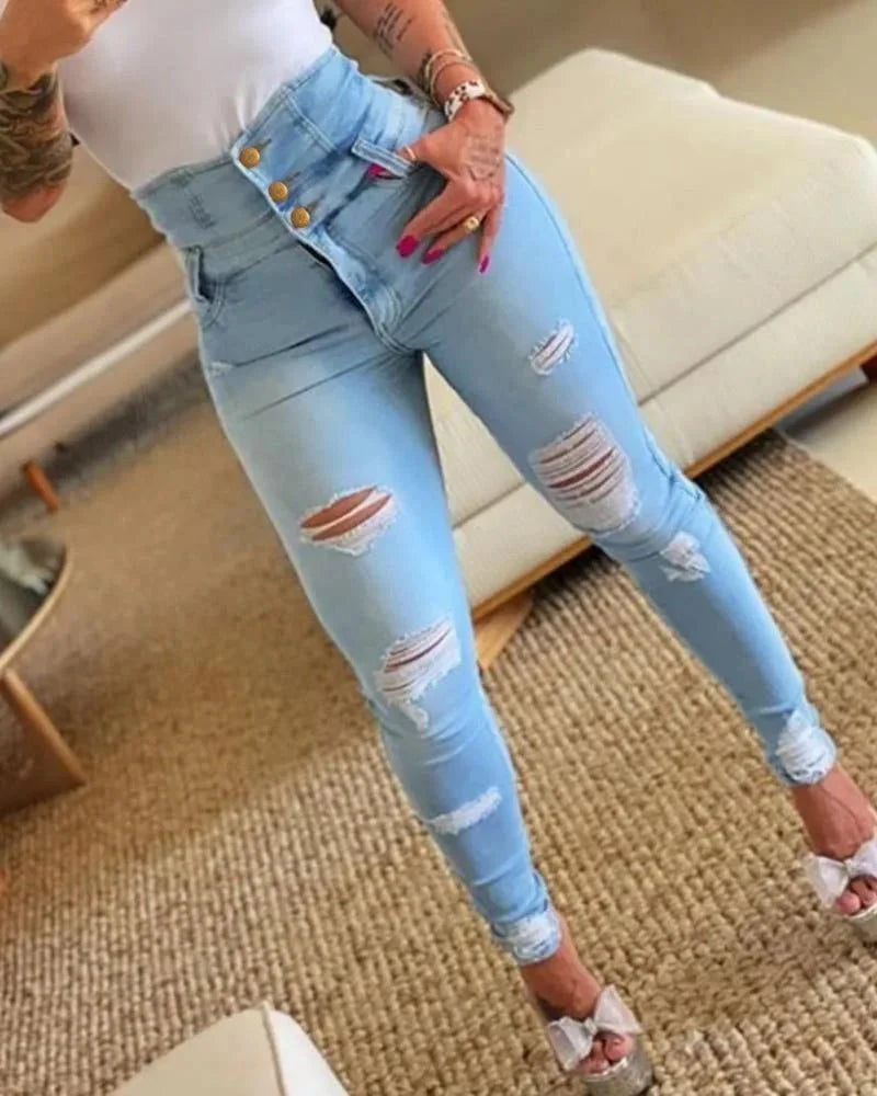 Women’s high waist skinny shaping jeans by Showlu Fashion with distressed denim, push-up effect, and slim fit for a stylish look.