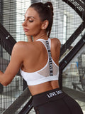 Showlu Women's nylon sports bra with push-up design, suitable for running, yoga, and gym workouts, featuring a supportive crop top style.