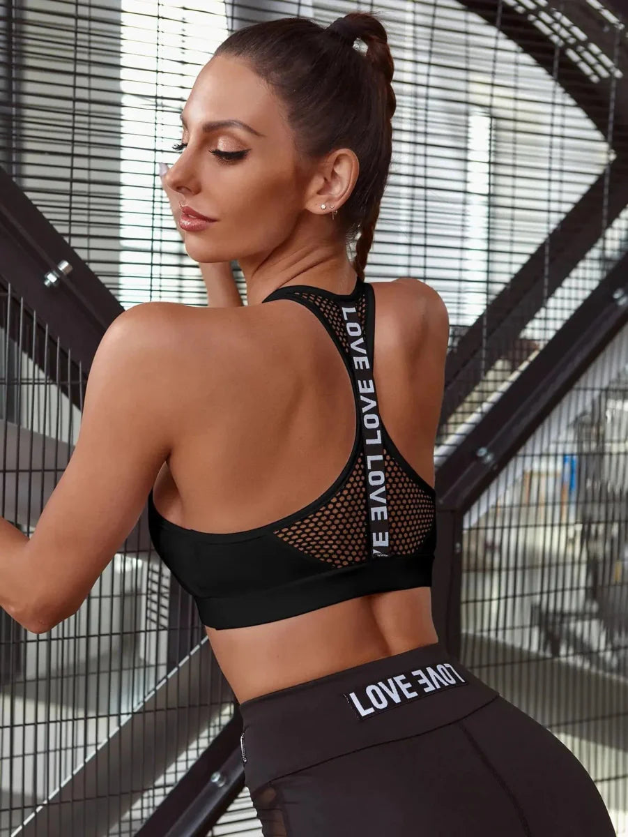 Showlu Women's nylon sports bra with push-up design, featuring a fitted crop top for running and yoga workouts.