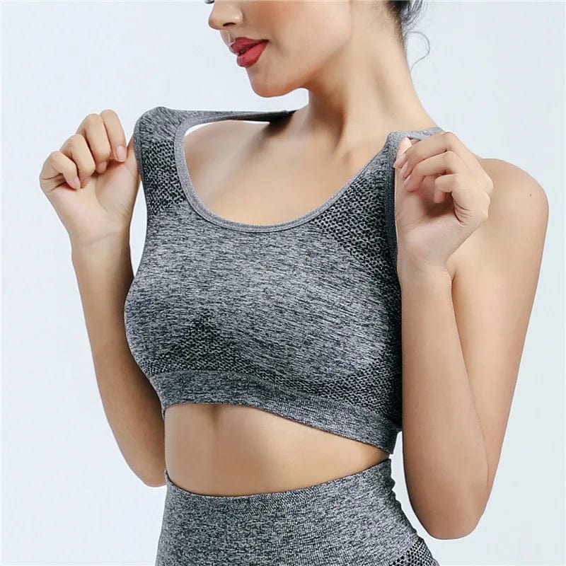 Women’s Showlu Fashion breathable polyester push-up yoga sports bra, designed for fitness, running, and gym workouts.