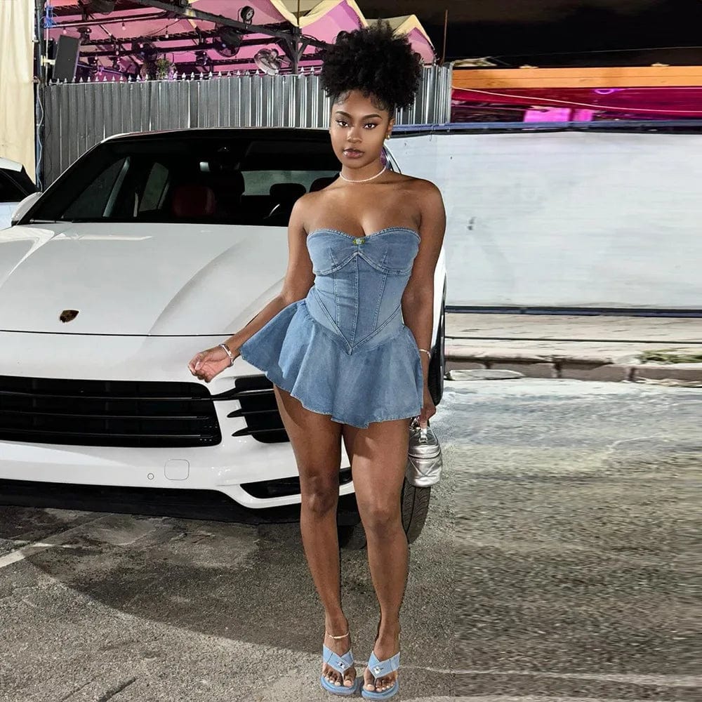 Women's backless ruffle denim mini dress by SHOWLU, featuring a sexy blue wash, zipper detail, and flattering skater style.