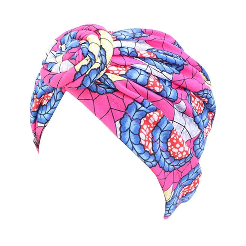 Showlu Women's Cotton Tie Turban Hat with bohemian twist, top knot style, African-inspired headwrap, ideal as chemo cap or hair accessory.