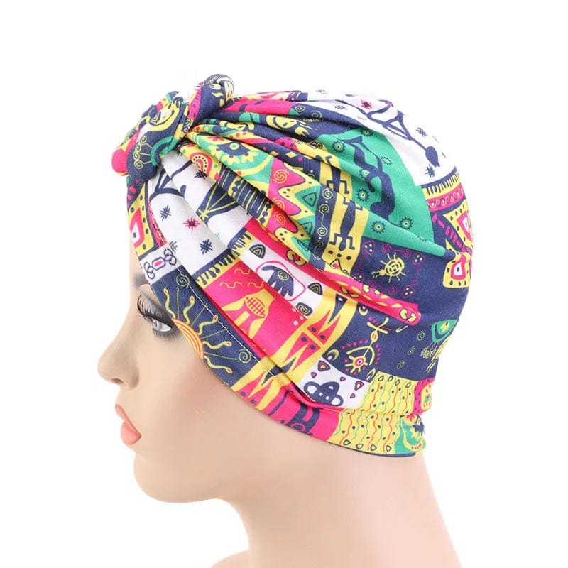 Women’s cotton tie turban hat with bohemian twist, featuring a top knot and African-inspired style, perfect as a chemo cap or hair accessory.
