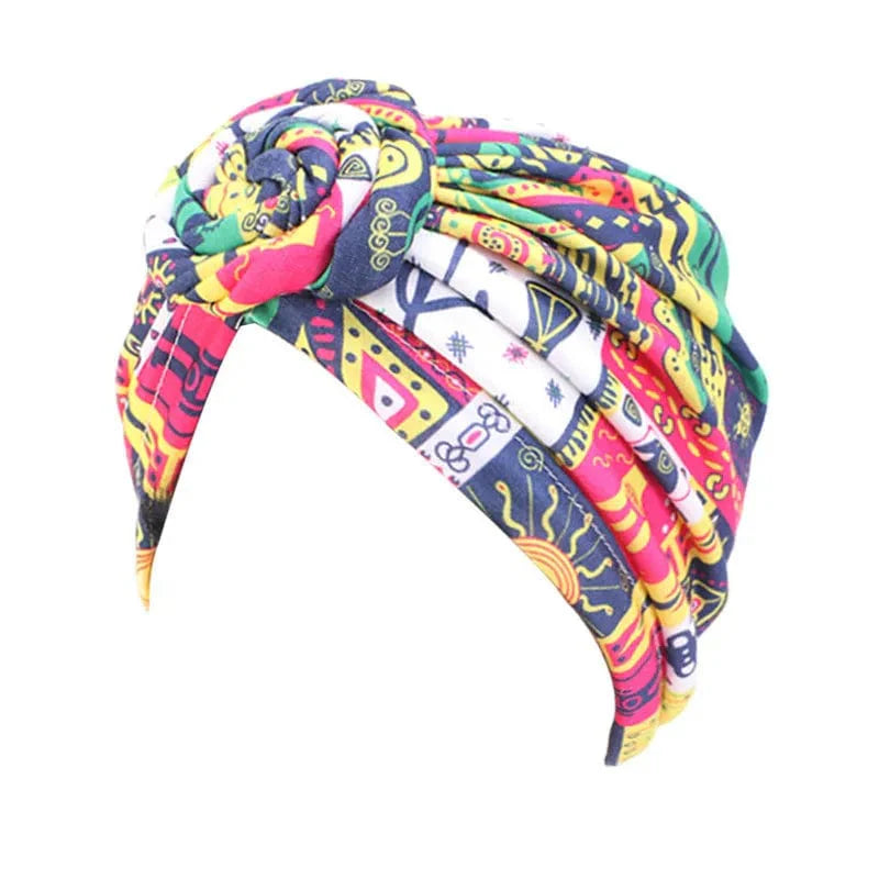 Women wearing Showlu Women's Cotton Tie Turban Hat with bohemian twist, featuring a top knot and African-inspired design.