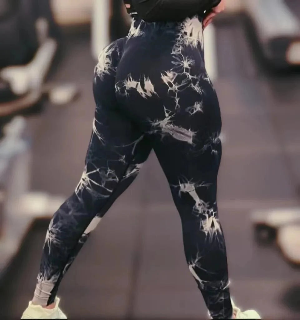 Women wearing Caeruleus Women's Tie-Dye Seamless Gym Leggings from Showlu Fashion Store, high waist yoga pants for fitness and active wear.