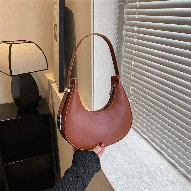 Women's PU leather saddle bag with Korean style design, shoulder strap, compact and stylish for everyday use.