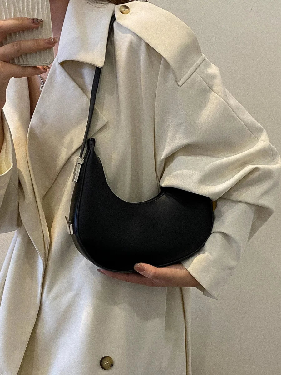 Women's PU leather saddle bag by SHOWLU FASHION, Korean style shoulder satchel with a sleek, compact design and structured silhouette.