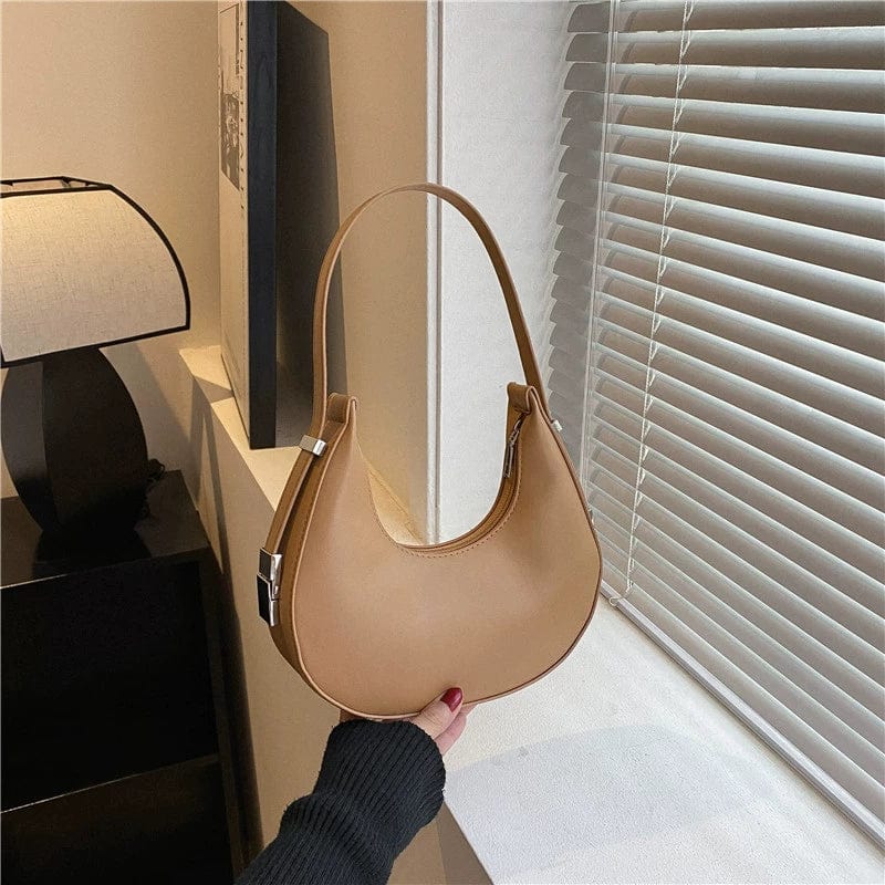 Women's PU leather saddle bag by SHOWLU FASHION STORE, Korean style shoulder satchel with sleek design and top handle.