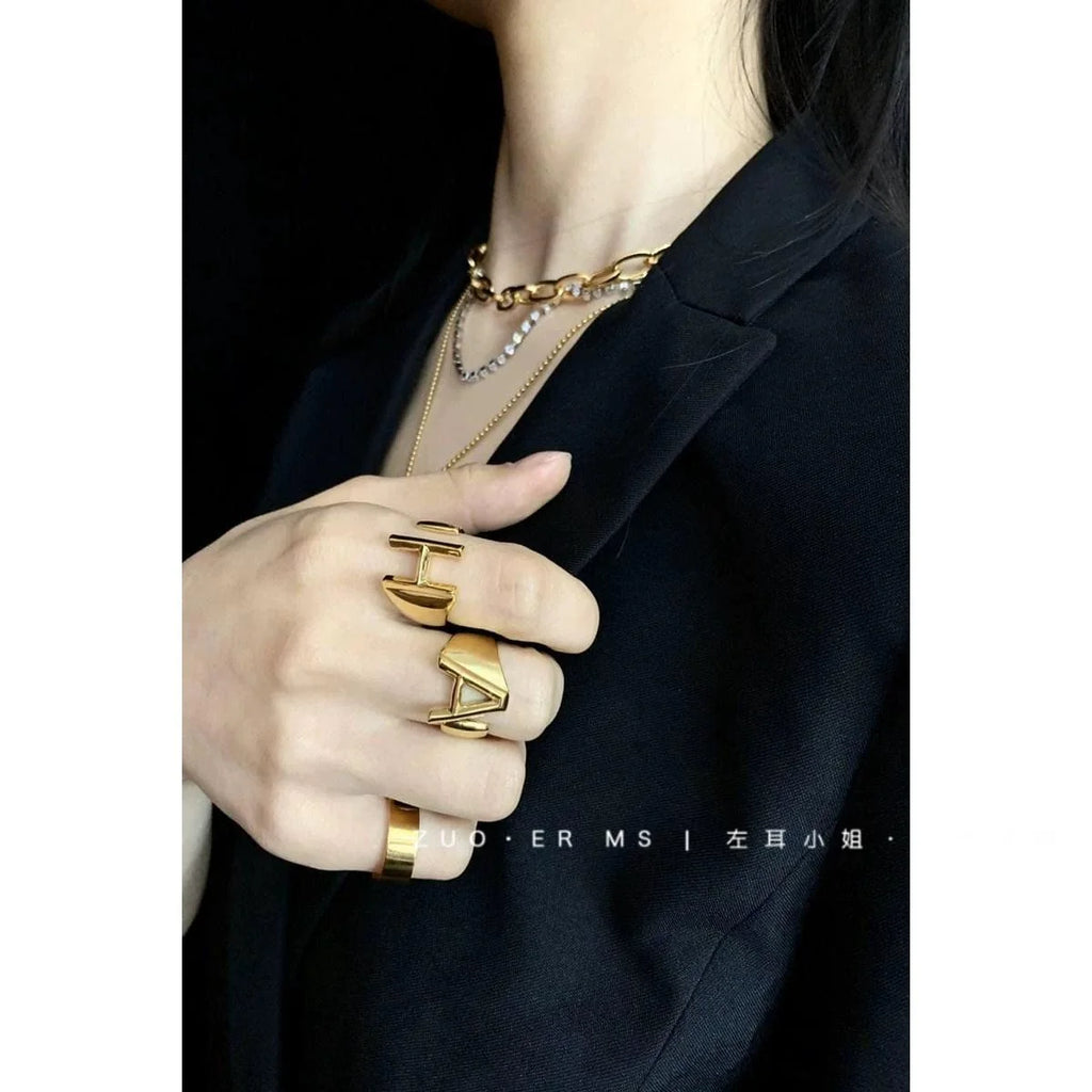 Gold-plated open adjustable women's ring with letter pattern, stylish jewelry by Showlu Fashion Store.
