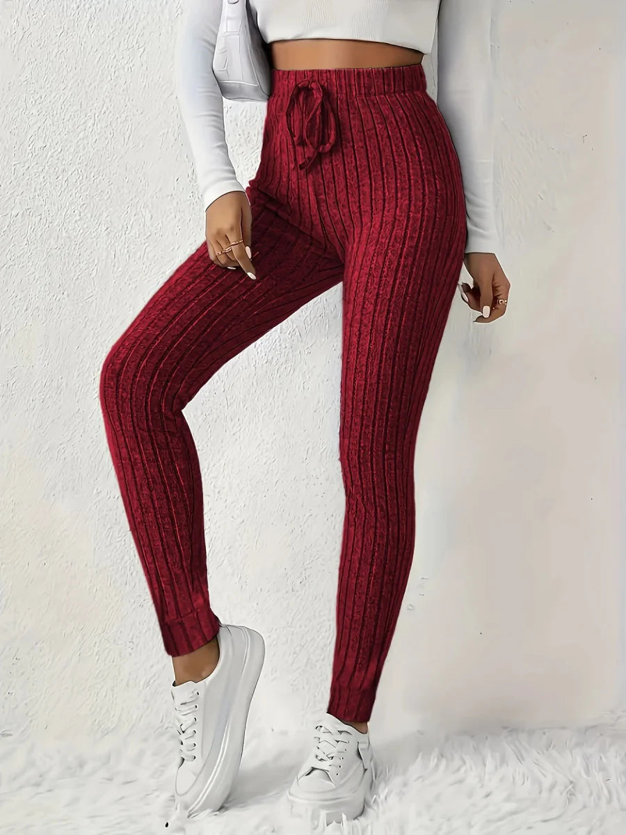 Showlu Women's knitted slim-fit pencil pants with tapered legs, straight-leg design, and comfortable, tightened waistband.