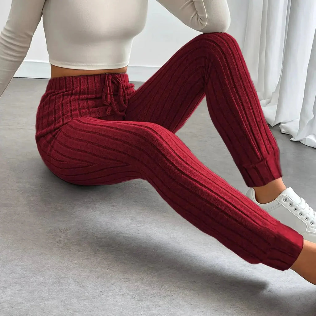Showlu Women's knitted slim-fit pencil pants with tapered legs and a tightened waistband, stylish and comfortable for everyday wear.