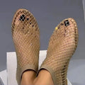 Women's hollow mesh flat sandals with round toe and rhinestone accents, featuring a flat sole and stylish short boot design.