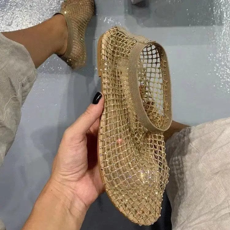 Women's hollow mesh flat sandals with round toes and rhinestone accents, featuring a stylish, flat-bottom design.