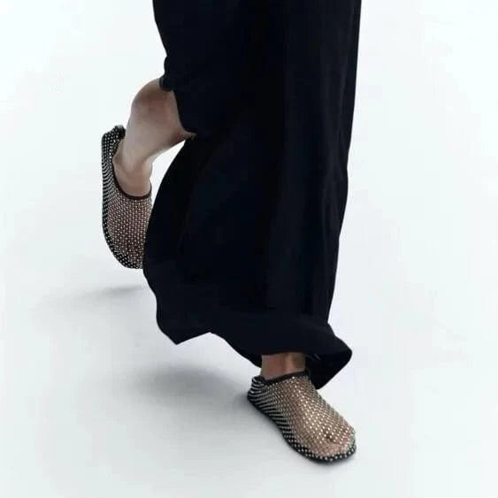 Women's hollow mesh flat sandals by Showlu Fashion with round toe, rhinestone accents, and a stylish flat-bottom design.