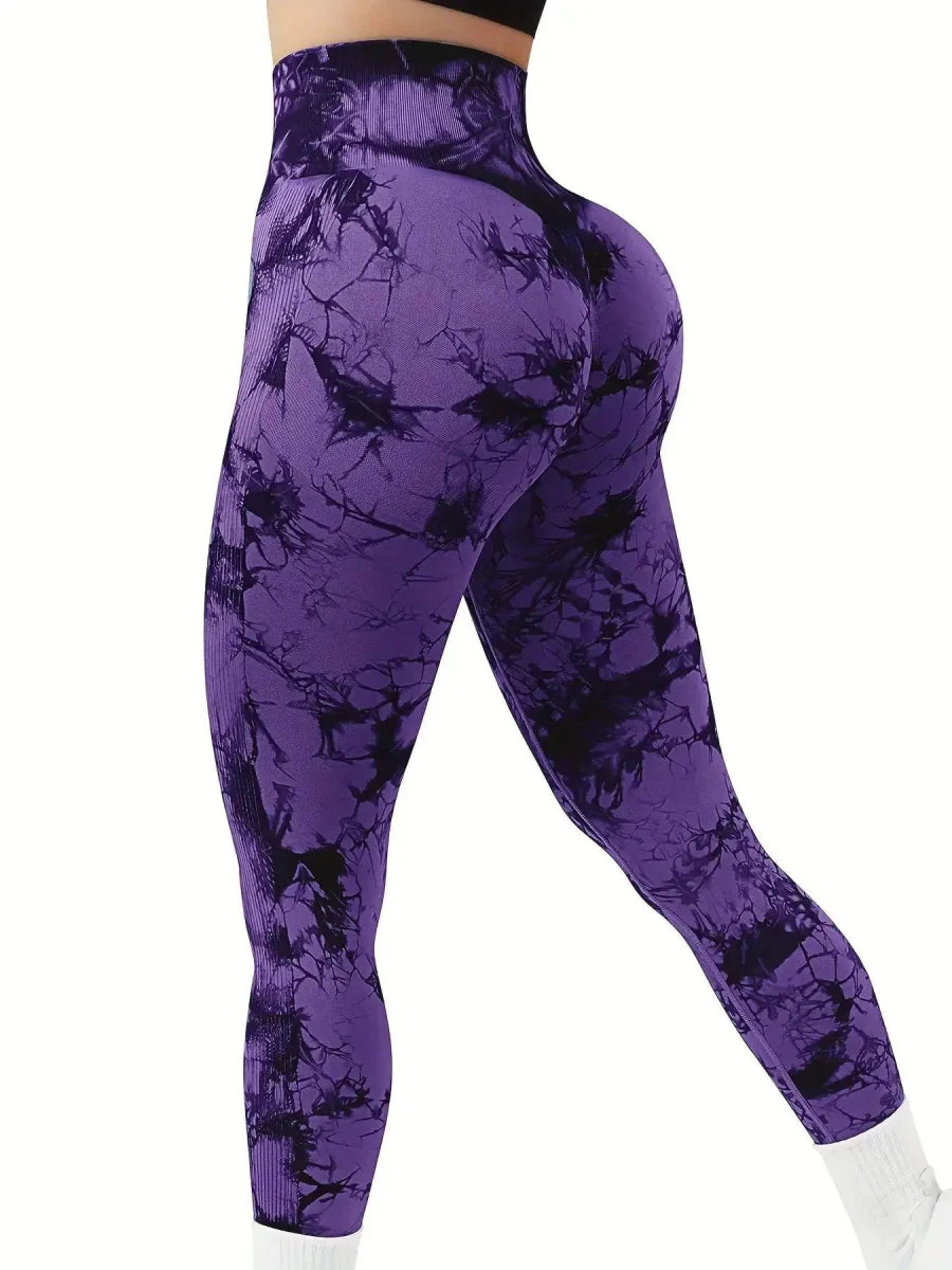 Showlu women's tie-dye peach high-waist seamless yoga pants with stretch fit and nylon material, designed for fitness and active wear.