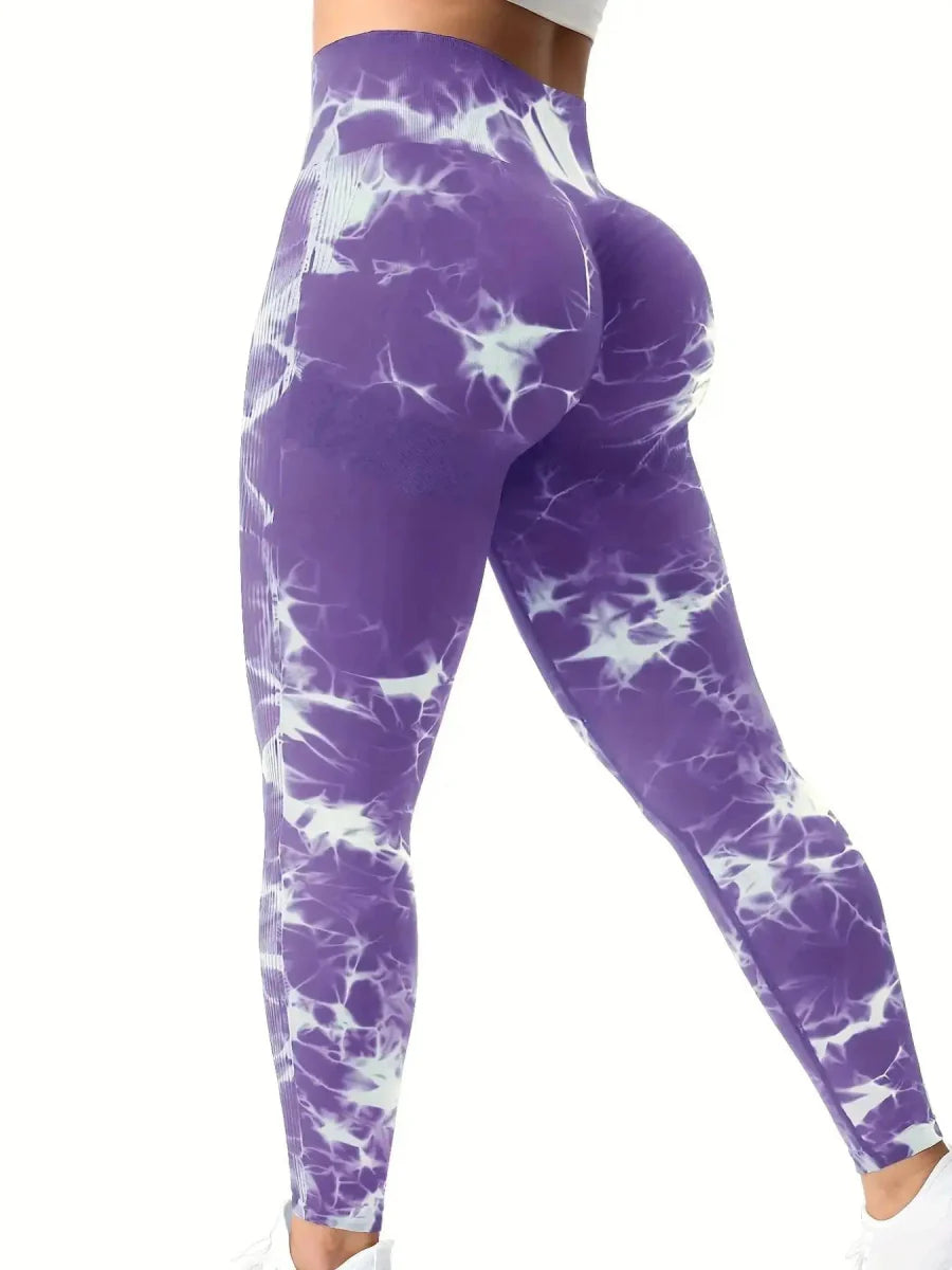 Showlu Women's tie-dye peach high-waist seamless yoga pants with stretch nylon fabric and flattering fit for fitness and casual wear.