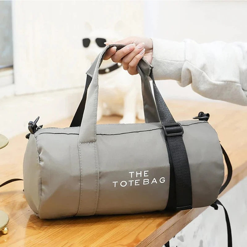 Showlu Women's nylon gym bag with shoulder straps, compact design, suitable for yoga, fitness, travel, and outdoor activities.