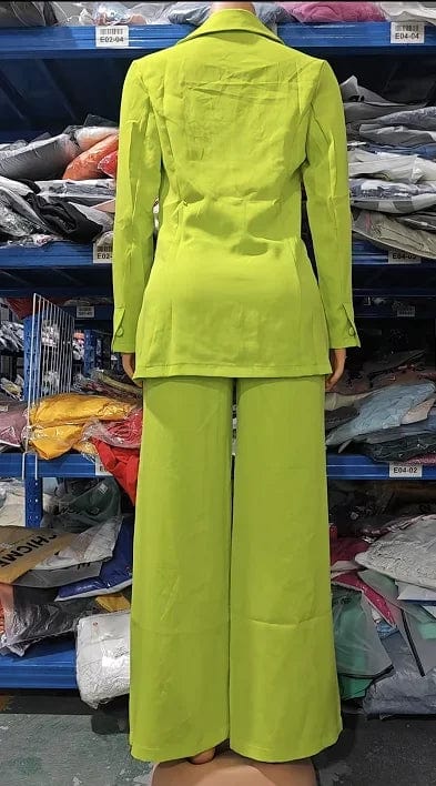 Elegant women's blazer and pants set featuring a notched collar, long sleeves, and button details, perfect for urban spring fashion.